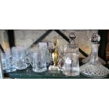 A pair of ships style decanters, two other decanters and glassware engraved as golfing trophies etc