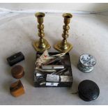 A pair of brass candlesticks, cloisonne box, treen boxes and some sewing items