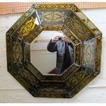 A Venetian style octagonal mirror with decorative gilt decoration to surround