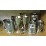 A plated ice bucket, tankards etc