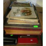 Various loose stamps, stamp collecting pockets, small group of postcards and books