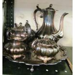 A plated salvers and a four piece tea/coffee set