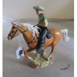 A Beswick Palamino and Cowboy No 1377 (damage to all four legs and one leg of cowboy)