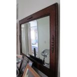 An oak framed mirror