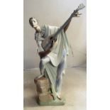A Lladro lute player (a/f)