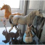 A Royal Doulton horse Welsh pony (leg repaired), another Palomino and a Beswick Mrs Rabbit and