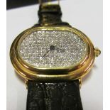 A Baume Mercier 18ct gold diamond faced watch