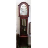 A modern mahogany grandmother clock arched silvered dial with cherub spandrels, glass door revealing