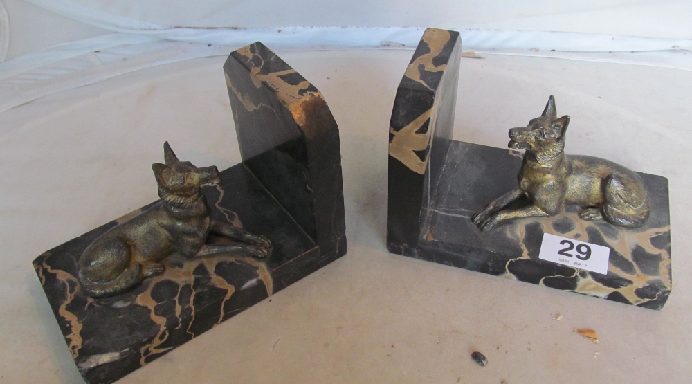 A pair of marble bookends with alsations lying down, two eastern brass ewers, a brass deity statue - Image 4 of 10