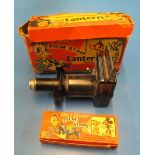 A Mickey Mouse Film Star lantern and film strips in original box and an Ace projector with Dixon