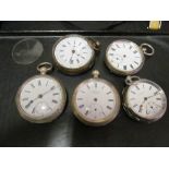 A Victorian silver key wind pocket watch (glass loose) and four others in base metal (a/f)