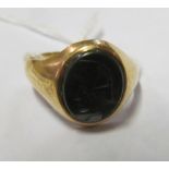 A 9ct gold signet ring Size R