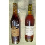 A bottle of 1964 Comte de Lamaestre Armagnac and a bottle of Chateau Latrezotti Sauternes 1986