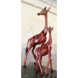 Two treen giraffes