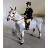 A Beswick Dapple grey horse and huntswoman No 1730 (slight glaze missing to one ear)