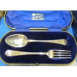 A silver christening set spoon and fork (i.c) and a silver brush and comb set (i.c)