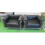 A pair of modern armchairs after a design by Le Corbusier black leather cushions on chromium