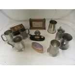 Various pewter tankards, two desk calenders and a silver backed clothes brush