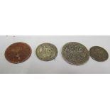 A George III silver shilling 1787, a Victorian Maundy 4d 1854, a George V sixpence 1927 and