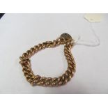 A 9ct gold chain bracelet with padlock clasp 44.6 gms