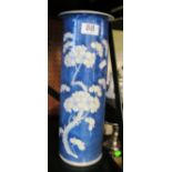 An oriental vase decorated prunus on a blue ground