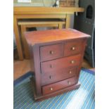 A small mahogany chest two short and three long drawers