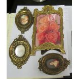 An Art Nouveau frame, modern frames and portraits