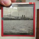 A box of slides Crete, Atlas, Gibraltar and print 'Awaiting the Return of Mr. Tinkham'