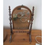 A miniature mahogany chest four drawers and swing mirror