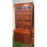 A tall modern yew cabinet 6'10" high, 3'1/2" wide