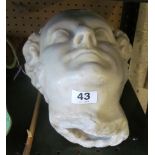 A plaster marble effect bust of a gentleman