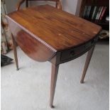 A 19th Century mahogany Pembroke table with drawer