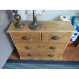 A small narrow pine chest two short and two long drawers