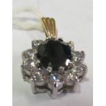 A 9ct gold and blue stone pendant