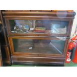 A pair of Globe Wernicke bookcases currently as three with one adapted