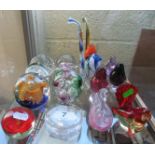 Seven glass paperweights, two glass pipes and various glass birds