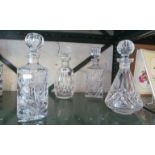 Four various glass decanters