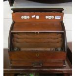 A 19th Century oak desk stationary box with calender, roll top and drawer