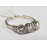 A platinum three stone diamond ring size N/O