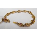 A 15ct gold floral link bracelet set ruby and diamonds 22.3g