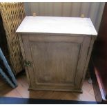 A small oak cabinet and pine cabinet