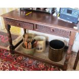 An oak table with two drawers