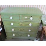 A green painted pine chest of two short and three long drawers