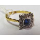 An 18ct gold and platinum square sapphire and diamond cluster ring