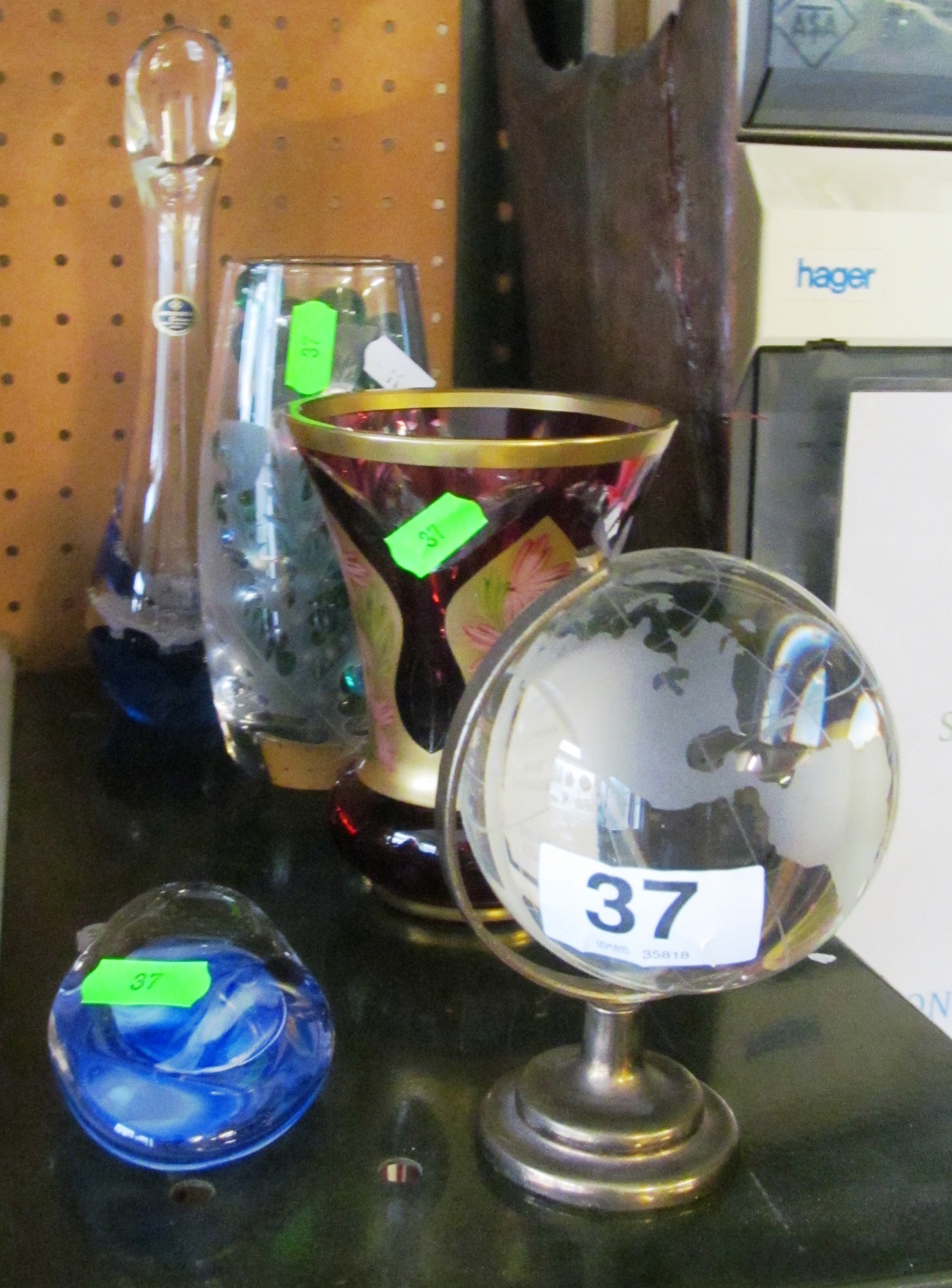 Various glass ornaments including a miniature globe