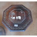 An early 20th Century table inlaid scene of elephants (one missing) on folding inlaid stand