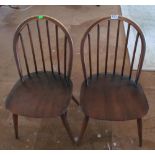 Two Ercol dining chairs