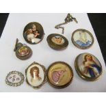 Four porcelain plaques, two brooches and scent bottle