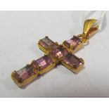 An amethyst set cross