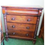 A Victorian mahogany chest of four drawers with turned pillars 3'7" wide
